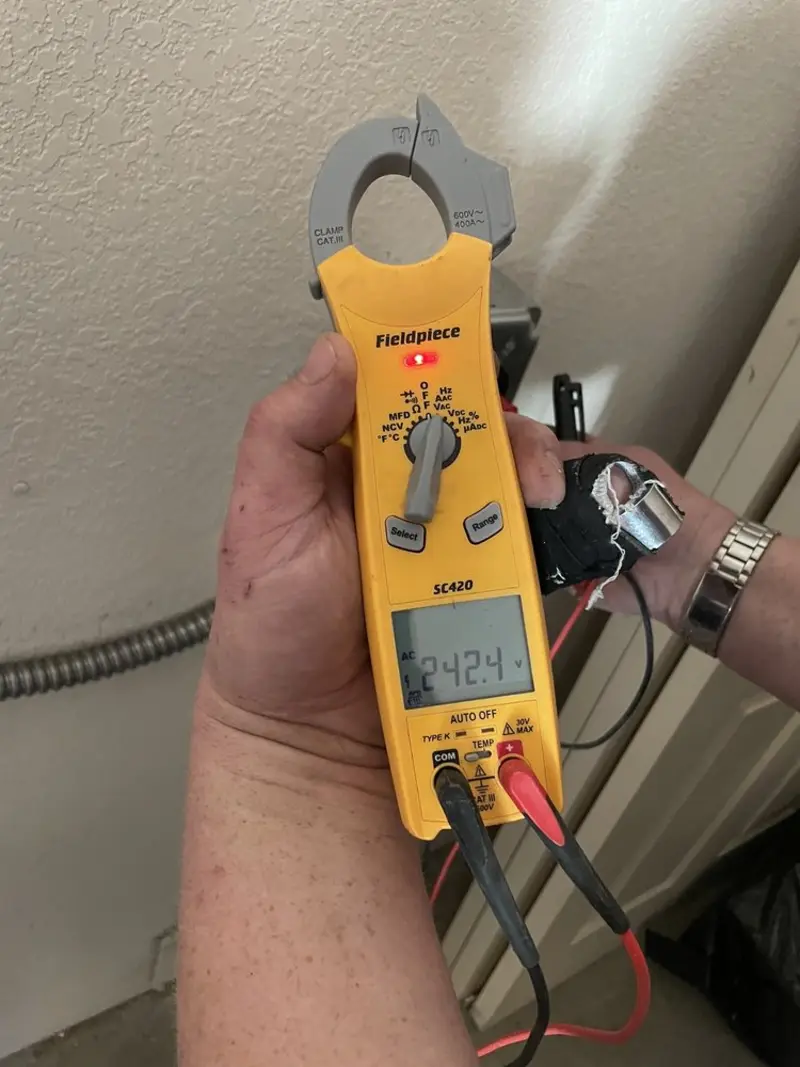 Voltage testing with clamp meter during Hot Tub / Pool Electrical Wiring in Richfield